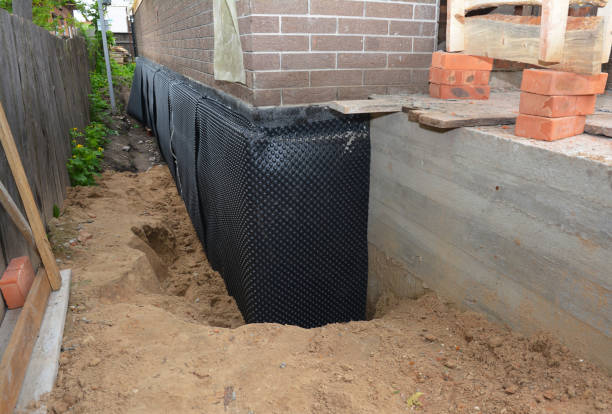 Happy homeowners after waterproofing job in Chantilly